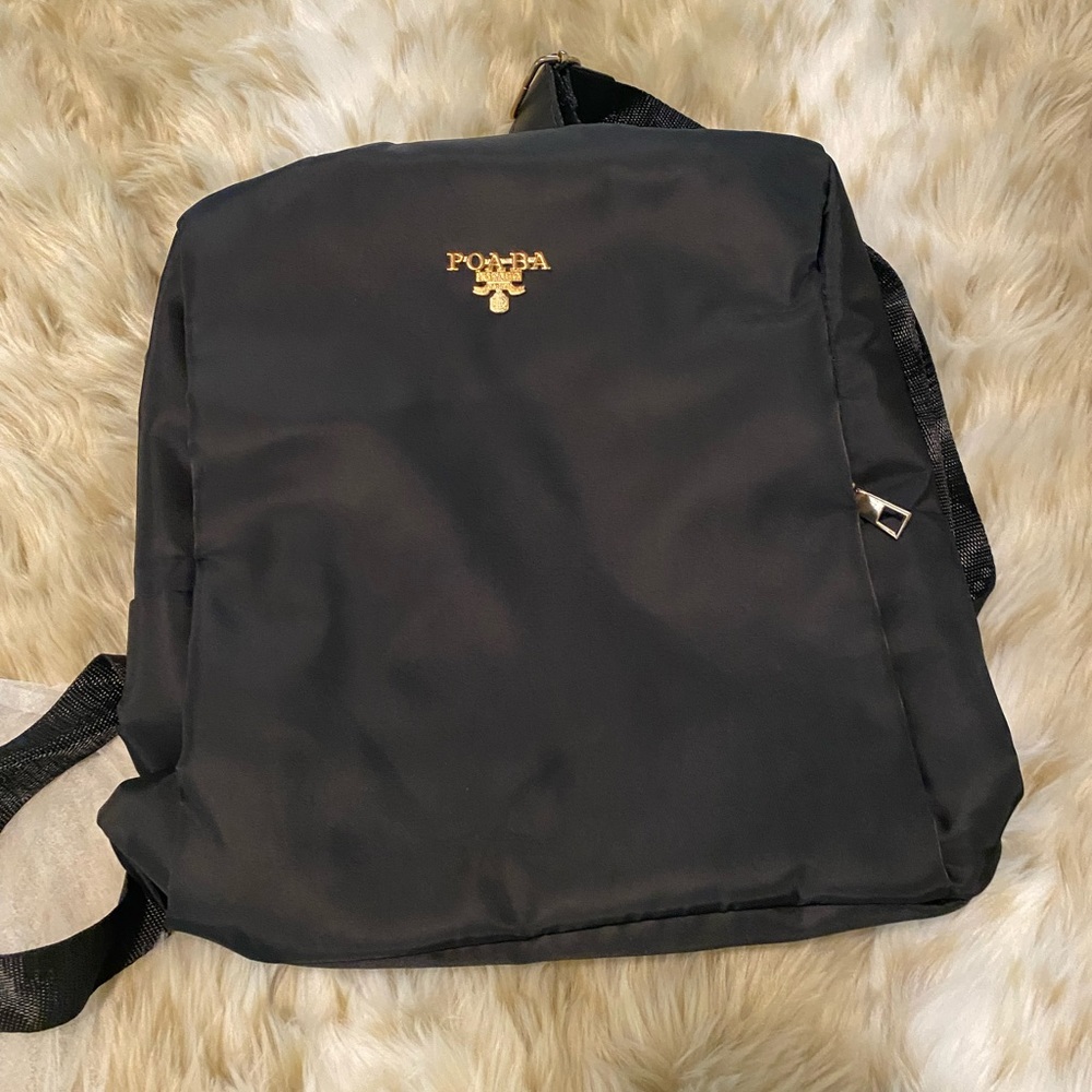 Poaba bags Brand new took out of package to take pictures including keychain